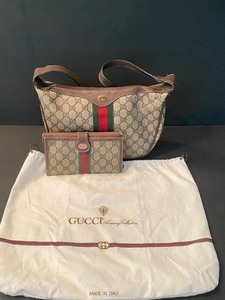 lot 12 image: Vintage Gucci Handbag and Wallet