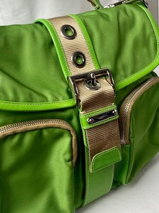 lot 78 image: Green Prada Handbag