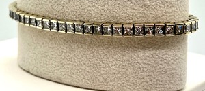 lot 14 image: Gorgeous and Sparkly 14k Gold and Diamond Tennis Bracelet