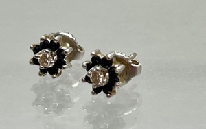 lot 115 image: Pair of 14k White Gold and Diamond Halo Style Earrings