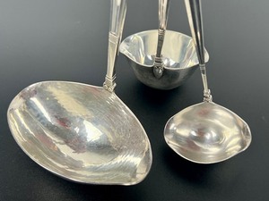 lot 145 image: Three Georg Jensen Sterling Silver Acorn Pattern Sauce Ladles