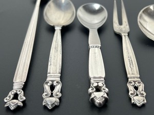 lot 151 image: Variety of Six Georg Jensen Acorn Sterling Silver Utensils