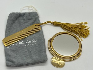 lot 184 image: Miniature Judith Lieber Gold Mirror and Comb Set with Dust Bag