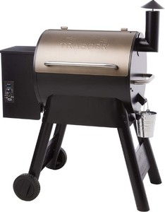 lot 121 image: Traeger Grills Pro Series 22 Electric Wood Pellet Grill and Smoker, Bronze - Broken Wheel, Slight scratch and dent. Works. TFB57PZBO. Never Used.
