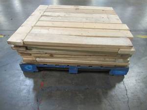 lot 118 image: PALLET OF CUT WOOD.  (64 Pieces) Most are 38 12 x 5 14 x 1 12. Count and measurements are approximate.