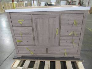 lot 125 image: Kendall 48 in. W x 20 in. D Bath Vanity in Distressed Oak with Engineered Stone Vanity Top in White with White Basin, SLight Chip on Top Front and Damage inside door.