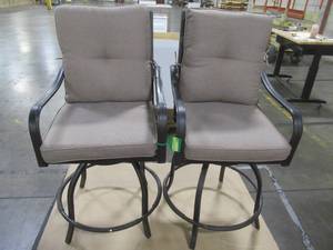 lot 129 image: Ulax Furniture Swivel Metal Counter-Height Outdoor Bar Stools with Beige Cushions (2-Piece) - One Chair seat wobbles and feels unstable when sat on.