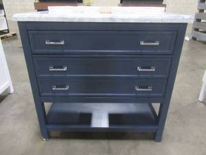lot 182 image: Everett 37 in. W x 22 in. D Vanity Cabinet in Aegean Blue with Carrara Marble Vanity Top in White with White Basin, Small scratcheschips in feet.