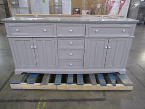 lot 184 image: Fremont 72 in. W x 22 in. D Double Vanity in Grey with Granite Vanity Top in Grey with White Basin, Slight Crack on LH Side Panel.