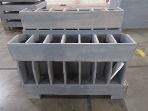 lot 203 image: 9 Wood Display Bins, Approximately 46 x 14 D. 7 storage compartments each. Used in retail store.
