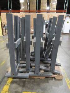 lot 210 image: Pallet of Wood Flooring Display Racks - Used for interlocking flooring display and retail signage. Approximately 18 x 22 x 43 Tall.