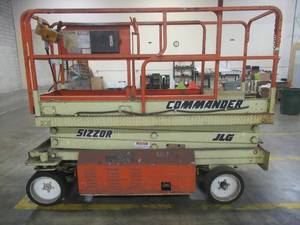 lot 99 image: JLG INDUSTRIES COMMANDER PLATFORM SCISSORLIFT, CM-2033, 24v, Max HeightLoad - 20750lbs - NEEDS WORK