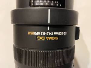 lot 242 image: Nikon D7000 35mm Camera with Assorted Lenses