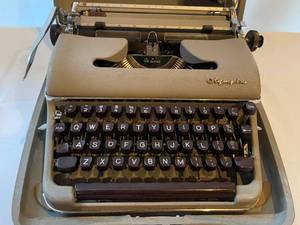 lot 365 image: Vintage Olympia Typewriter with Metal Case