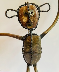 lot 259 image: Fun and Whimsical Rock and Metal Wall Hanging