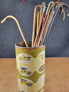lot 2033 image: Huge Lot of Old Wood Canes in a Cool Auto Themed Can - NO SHIPPING