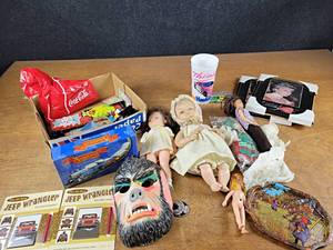 lot 2036 image: Vintage Halloween Mask, Old Dolls, Days of Thunder Cup, Car and More