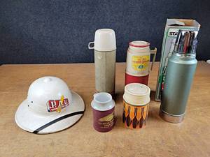 lot 2093 image: Vintage Thermoses and Vintage J.A.G Hat