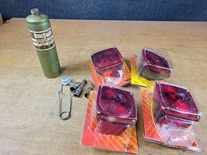 lot 2100 image: (4) New in Package Taillights and Torch