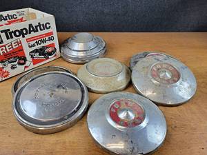 lot 2114 image: Collection of FORD and Chevrolet Hubcaps