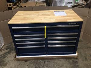 46 in. W x 24.5 in. D Standard Duty 9-Drawer Mobile Workbench Tool Chest with Solid Wood Top in Gloss Blue by Husky Customer Returns See Terms on Auction
