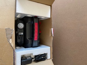 lot 18 image: Husky 8-in-1 12-Volt Power SourceJumpstarter