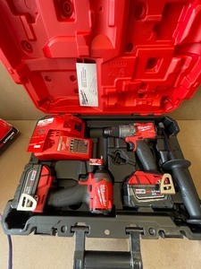 lot 27 image: Milwaukee M18 FUEL 18V Lithium-lon Brushless Cordless Hammer Drill and Impact Driver Combo Kit (2-Tool) with Two 5Ah Batteries