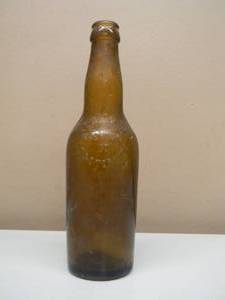 lot 51 image: VINTAGE PRE PRHIBITION ENGESSER BREWING CO. ST. PETER MINN AMBER EMBOSSED BEER BOTTLE - RARE AWESOME PIECE - APPROX 9.75 - SEE PICTURES