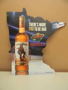 lot 56 image: MINNESOTA WILD CAPTAIN MORGAN TIN SIGN - VERY COOL PIECE - APPROX 21 By 26 - SEE PICTURES