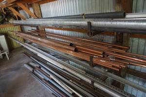 lot 24 image: Large Rack of Assorted Copper, Metal and PVC Pipe