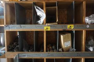 lot 39 image: Partitioned Shelving With Black Iron Fittings