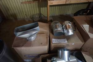 lot 56 image: Large Lot of Galvanized T Saddles, Elbows, and Right Angle Boots