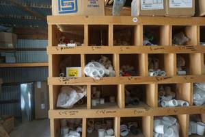 lot 63 image: Partitioned Shelving Unit With Assorted PVC Pipe Fittings