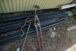 lot 84 image: Lot of Cast Iron Utility Pipe and Wrenches