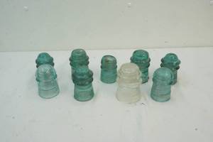 lot 102 image: vintage glass telephone insulators