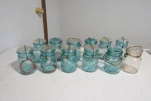 lot 235 image: blue glass canning jars