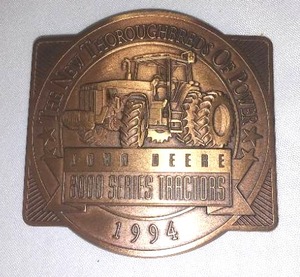 lot 440 image: John Deere Belt Buckle 8000 Series Tractors 1994. The New Thoroughbreds Of