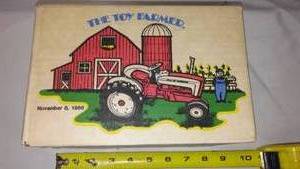 lot 483 image: National Farm Toy Show Nov. 8, 1986, Ford Tractor - Box Never