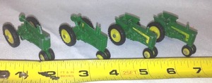 lot 551 image: (4) John Deere Tractors  Very Small Scale