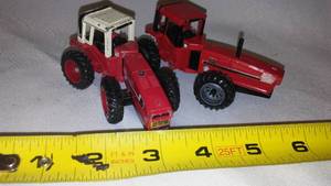 lot 556 image: (2) I.H. Tractors Models.