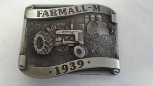 lot 563 image: Farmall BELT BUCKLE M-1939 Pewter