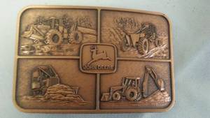 lot 569 image: John Deere BELT BUCKLE Rare Copper Color