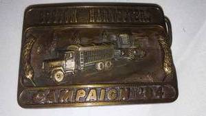 lot 571 image: Custom Harvesters Belt Buckle Campaign 1984