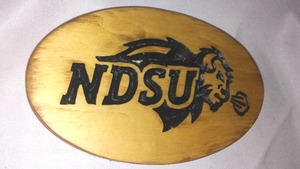 lot 575 image: NDSU Bison Wood Wall hanger Sign.
