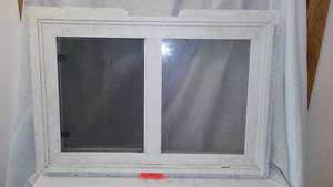 lot 591 image: New Vinyl Slider Window .