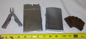 lot 593 image: Multi Tool, Belt Buckle & 2 Huge Lighters