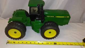 lot 619 image: John Deere Model 8760 Tractor.