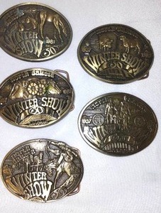 lot 646 image: (5) N.D. Winter Show BELT BUCKLE 1987 50th Anniversary