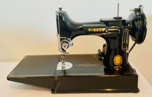 lot 112 image: Vintage Singer Featherweight 221 Sewing Machine with Case and Manual