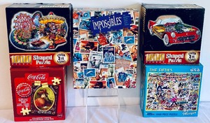 lot 206 image: Puzzles Puzzles Puzzles